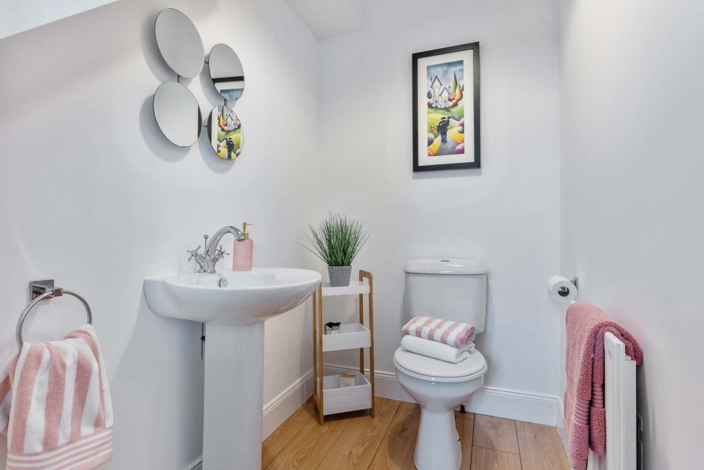 epic property staging white bathroom